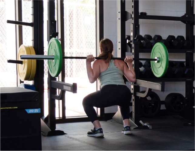 Lifting weights in the gym