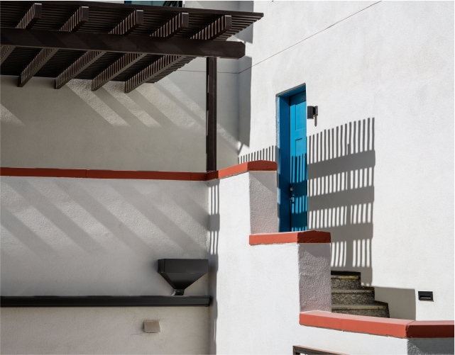 Entrance to an upper floor unit in the corner of a building